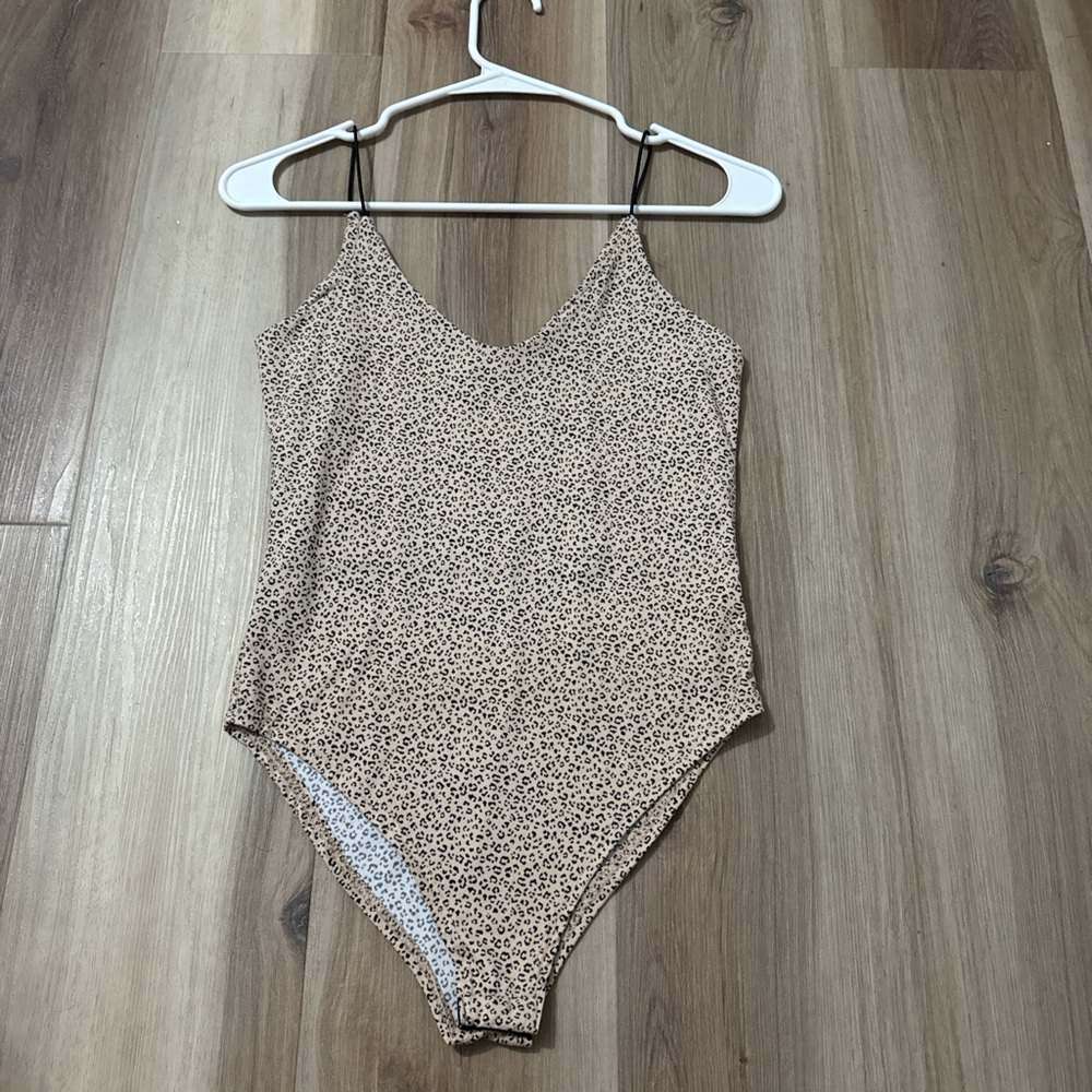Tan cheetah print one piece bodysuit